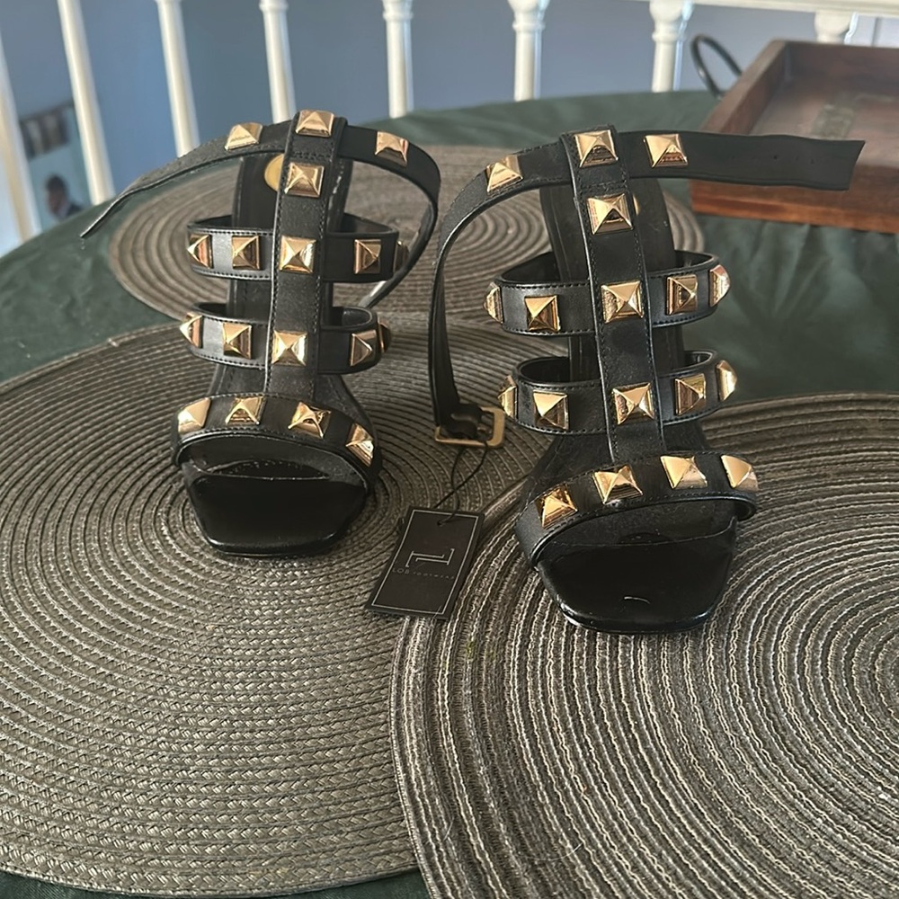Black and gold heels brand new